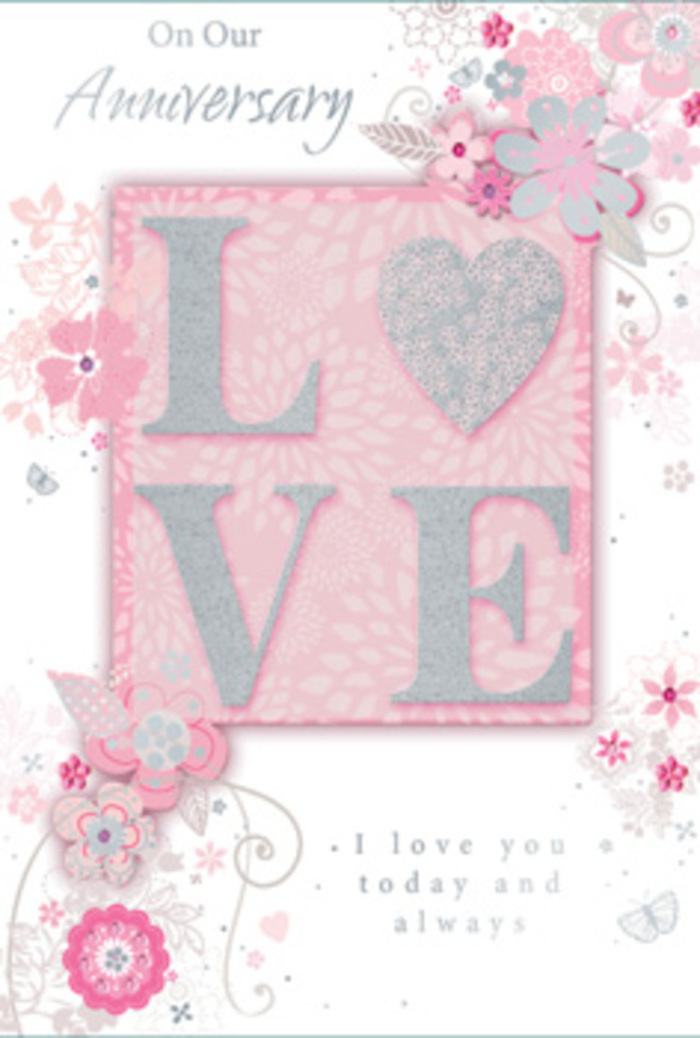 In this image, the anniversary card is presented almost like a piece of fine stationery art, reflecting the refined yet warm character of Nine Elms. At its heart stands the word LOVE, styled in bold capital letters that are embossed and kissed with a soft veil of glitter. The texture appears delicately grainy under the fingertip, catching light in tiny, sparkling flecks, similar to the way early evening sun glitters on the Thames nearby. The letters rest against a blush-toned panel that gently fades outward into a pale, almost pearlescent pink, giving the card depth and a dreamy radiance. Wrapping around this central motif is a gentle sweep of stylized flowers, fine leaves, and swirling stems, drawn with thin, intricate lines that resemble a florist's design sketch when planning a romantic anniversary arrangement. Each bloom is subtly shaded in blush, ivory, and soft grey, with occasional touches of mauve and silver to suggest overlapping petals and light. Some floral details are more abstract, mere curls and flourishes that evoke petals and fronds rather than depicting them precisely, lending the design a sense of lightness and motion. An anniversary greeting, written in graceful, flowing script, balances the design, its fluid strokes mirroring the natural arcs of the floral forms. Parts of the card are smooth and satin-like, while the raised glitter and embossed lettering offer a contrasting tactile richness. The overall impression is one of gentle celebration and enduring affection, as though the card were the paper companion to an anniversary bouquet delivered to a stylish Nine Elms residence-quietly elegant, modern, and deeply sincere.