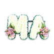 A dignified, custom-made sympathy tribute spells the initials MA in elegant capital letters, pictured against a clean white background as a product-style shot. Each letter, about 18 to 24 inches tall, is built from tightly packed, pure white chrysanthemums that create a soft, cloud-like surface with a quiet, substantial presence. The contours of both the M and the A are trimmed with a thin, deep green foliage border that gives crisp definition and a subtle contrast to the pristine blooms. At the lower left stem of the M and the lower right stem of the A, small clusters of accent flowers have been arranged with care: soft pink roses, muted lilac roses and tiny pink spray roses form gentle bouquets that bring warmth and tenderness to the composition. Feathery fern fronds tuck between those clusters, introducing a light, woodland texture that lifts the palette and catches the light. The craftsmanship is visible in the neat pleating of the green edge and the dense, even coverage of the white flowers, creating both a visual calm and a tactile softness. A faint, classic scent of roses blends with the understated, slightly spicy note of chrysanthemum, suggesting an arrangement intended for moments of remembrance-funeral services, wakes, or a chapel tribute. The overall effect is one of respect, comfort and understated elegance, a personalised floral expression that honours a loved one with clean lines and gentle colour accents while remaining appropriate for solemn occasions around Nine Elms and nearby memorial venues.