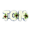 A serene, reverent tribute that spells the name TOM in three-dimensional, pillowy letters formed from countless small white chrysanthemums. Each bloom is set so closely together that the letters read as soft, cloud-like cushions of petals; the overall effect is a gentle, tactile surface that seems quiet to the touch. A narrow royal blue ribbon traces the edges of each letter, its crisp colour providing a dignified outline that lifts the white into subtle contrast and gives each curve and angle a composed clarity. Nestled into the centre and lower sections of each letter are balanced sprays of flowers: a single deep red rose anchors each cluster, its velvety petals a focal point of love and sorrow, surrounded by smaller creamy white spray roses and delicate fern fronds that add feathered greenery and texture. The composition sits on a dark green or black metal support bar that is deliberately low-profile but visible beneath the base, a reminder of the careful engineering that keeps the display upright at a chapel or graveside. The lighting is cool and even, a soft studio white background that isolates the arrangement and allows the colours to read pure and calm. As a florist who has arranged memorial tributes for families around Nine Elms and near Battersea Park, I sense the quiet dignity of this piece: understated yet formal, scented faintly with green stems and the subtle, satiny note of roses. It is an expression of respect and remembrance, made to be carried or placed beside a coffin, to stand at a service, or to be photographed for those who cannot attend in person.