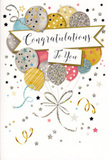 The photograph features a luminous congratulations card that feels as uplifted and hopeful as a new beginning in Nine Elms. Dominating the design is a joyful cluster of balloons, drawn in a palette of soft metallic tones: shimmering gold, cool silver, delicate champagne, serene sky blue, blush pink, and understated grey. These balloons are layered to suggest depth and movement, as if they are rising together into a pale, open sky like the view above the riverside walk. Each balloon has its own subtle embellishment - perhaps a halo of tiny stars, a ring of fine stripes, or a scattering of glitter-like dots - giving the impression of light catching gently on their surfaces. From their base, thin strings stretch downward and then curl into elegant loops, rendered in bright gold and silver lines that resemble the trailing ribbons of a celebration bouquet being carried along Nine Elms Lane. The background is soft and neutral, maybe a warm ivory or light cream, serving as a calm canvas for the metallic accents. Across this backdrop drift small stars, curly streamers, and delicate confetti specks, arranged so they appear to swirl around the balloons without overwhelming them, capturing a sense of quiet festivity. Cutting gracefully through the centre is a banner element, shaded and curved so it feels slightly raised from the surface. On this banner, the phrase Congratulations To You is scripted in flowing, elegant lettering, radiating sincerity and pride. The overall impression is of a quality card with smooth stock and subtly textured details, perfect for pairing with fresh flowers sent to celebrate graduations, new roles, or personal achievements for someone in the Nine Elms and Battersea area.
